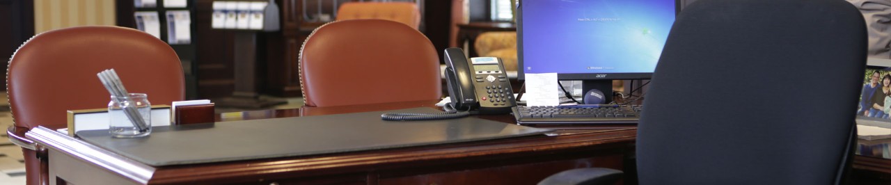 Working desk with computer and phone